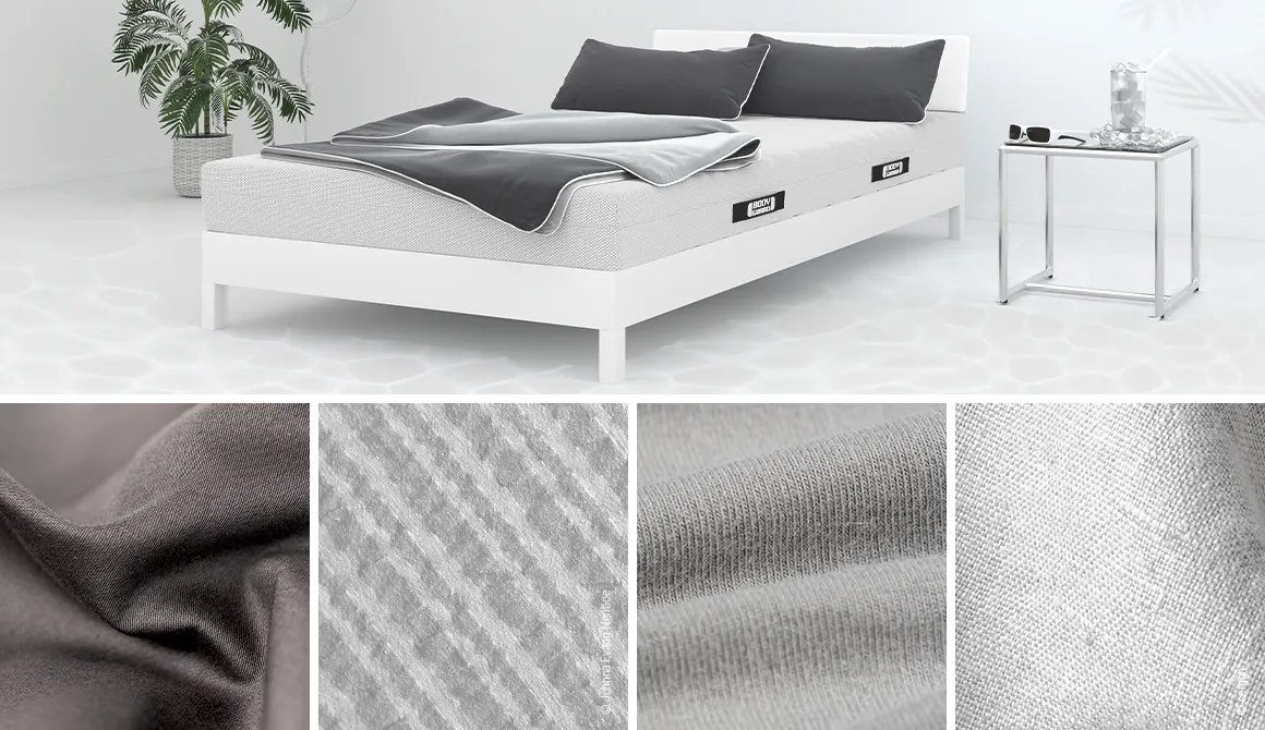Sobre una cama yacen sábanas cubiertas con ropa de cama de verano, que incluyen cuatro baldosas centradas en distintos tipos de ropa de cama lisa.